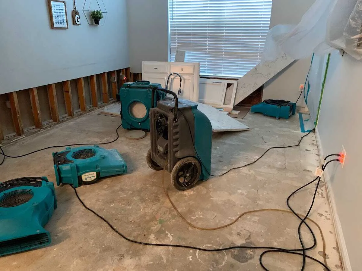Dehumidifier in flood-cut room for Water Damage Restoration in D'Iberville
